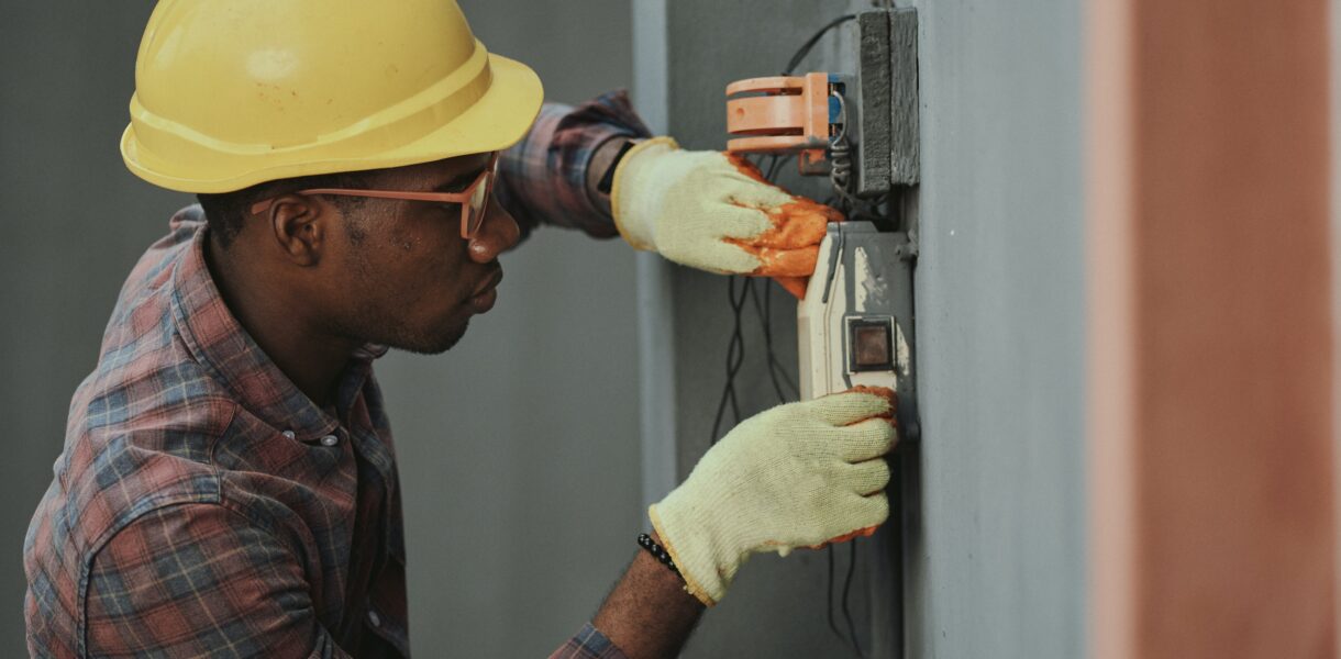 Young man working as a handyman