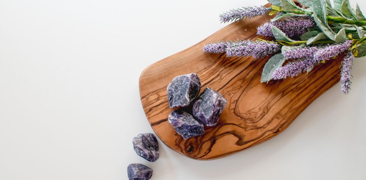 Gemstones on a wooden plate