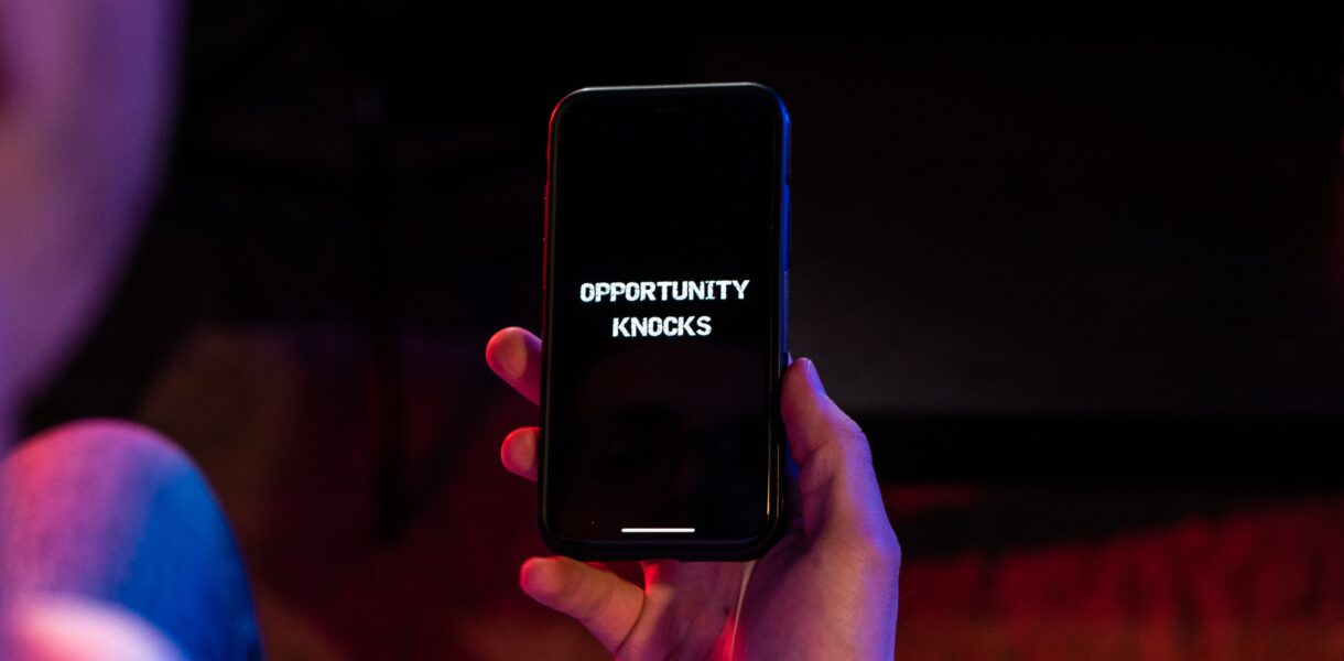 A smart phone shows that opportunities are knocking, because imposter syndrome often lets opportunities slip away.